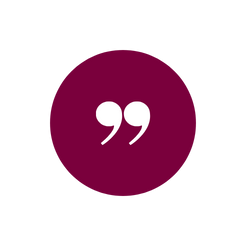 quotation marks on a maroon background